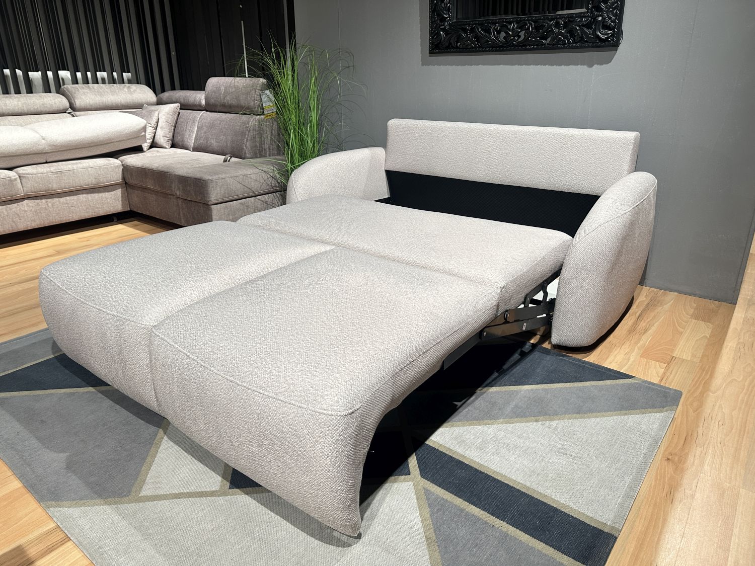 Sofa Stone z funkcją spania Puma, pojemnikiem na pościel. Zoya 