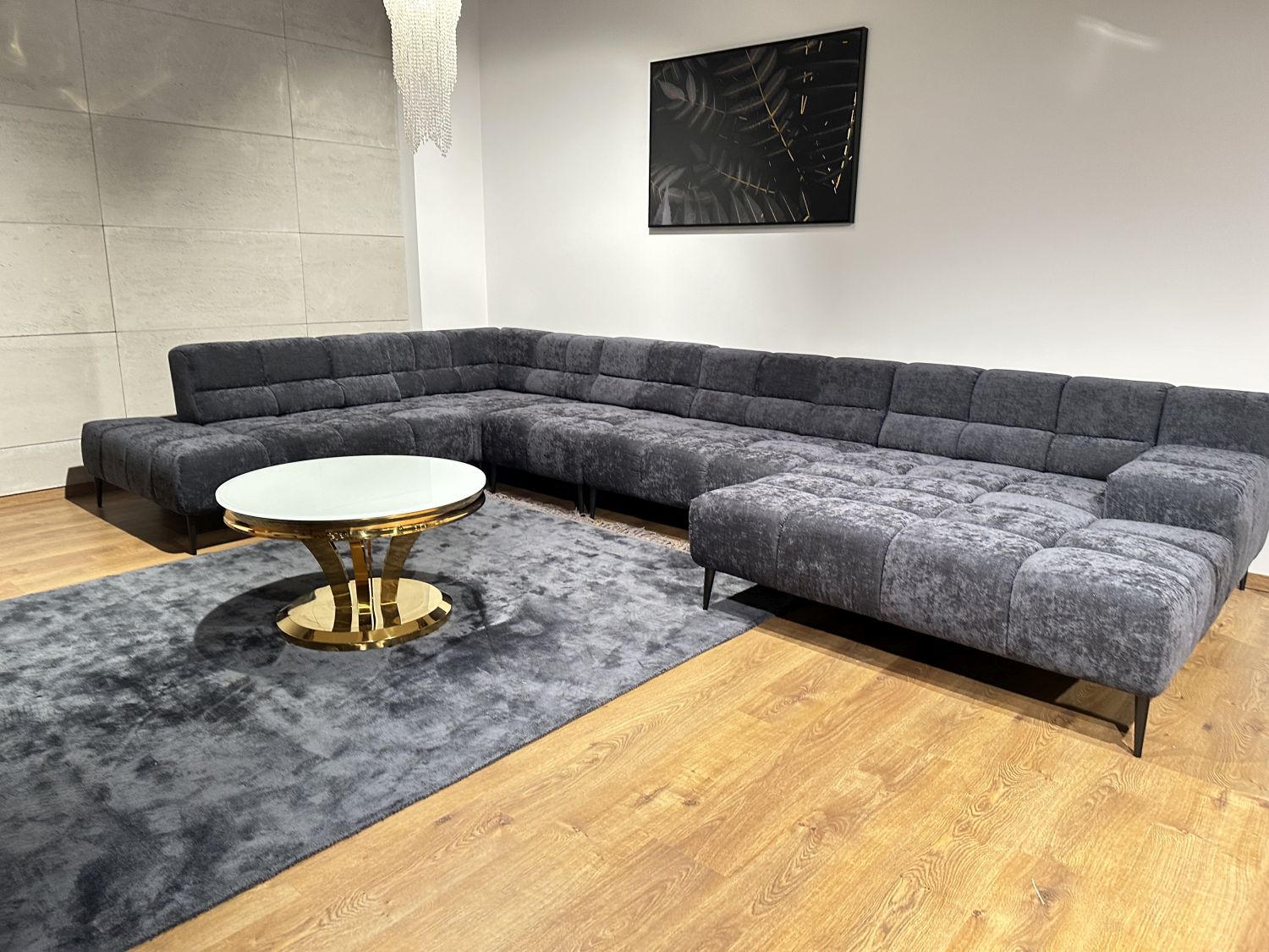Narożnik ekskluzywny Liam pikowany modułowy na wysokich nożkach Designwerk od Minimax Sofa
