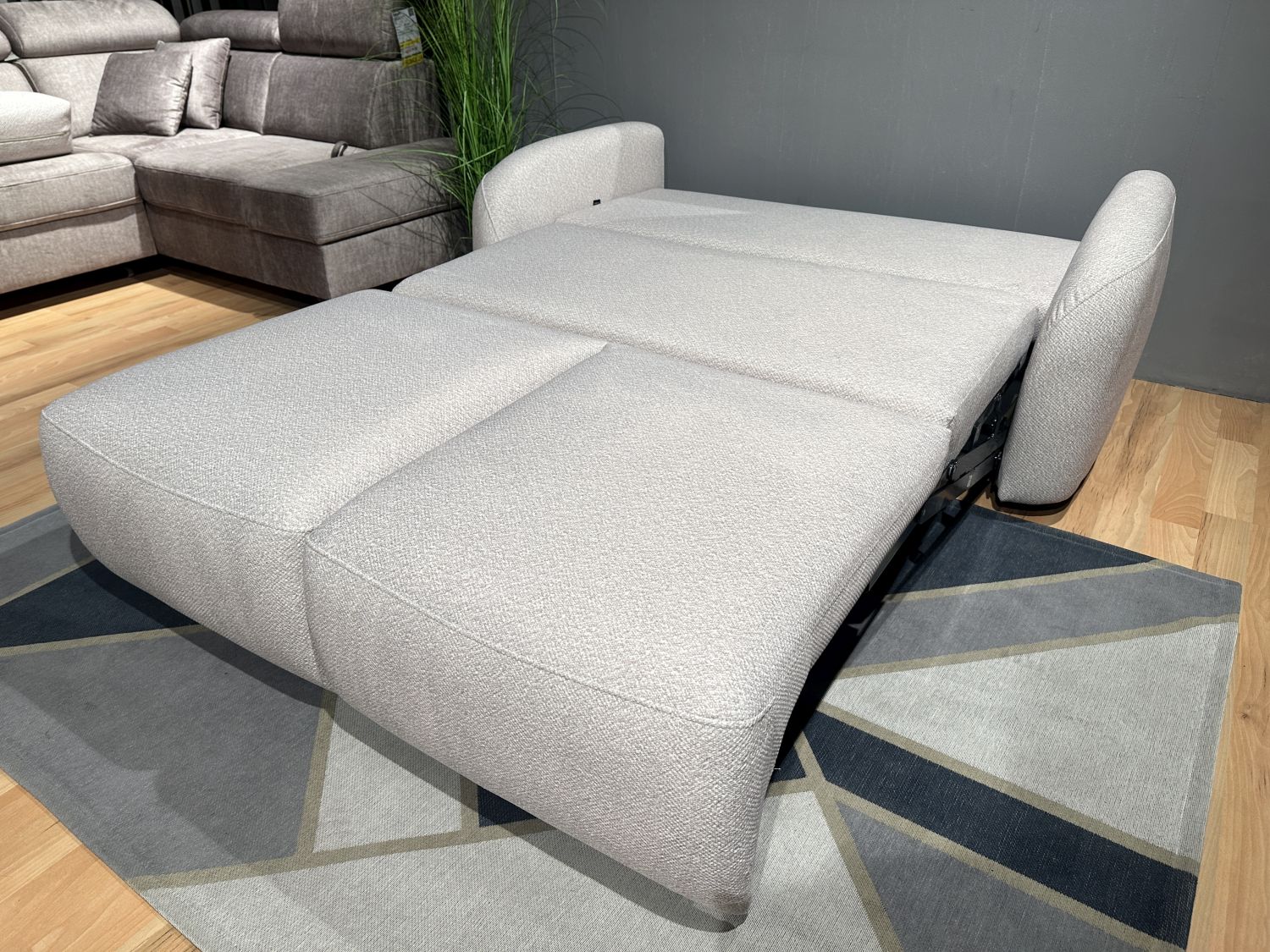 Sofa Stone z funkcją spania Puma, pojemnikiem na pościel. Zoya 